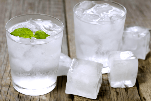 A glass of water with ice cubes A glass of water with ice cubes