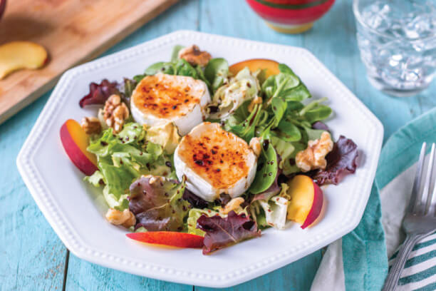 Healthy salad with greens fruits and nuts Healthy salad with greens fruits and nuts