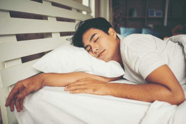 Ensure proper sleep Man sleeping peacefully