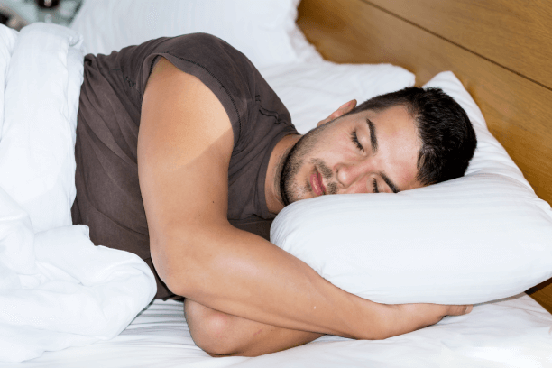 Man (in 30's) having a sound sleep Man (in 30's) having a sound sleep